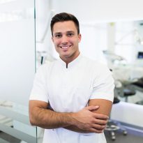 male dentist oral health month